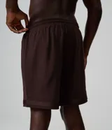 Bermuda deportiva Get Over de microfibra texturizada con tecnología Dry, de corte corto, cintura elástica con cordón ajustable y bolsillos laterales.