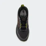 Championes de trekking New Balance Fresh Foam X Hierro v9, color negro con detalles en marrón y verde lima en la suela Vibram.