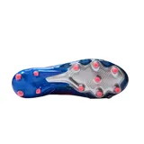 Championes de fútbol New Balance Tekela color azul con detalles en plateado y rojo.