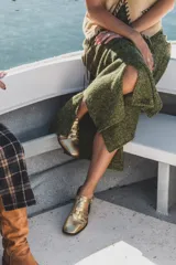 Pollera larga marrón de tejido de punto, con forro de lino y cintura elástica.