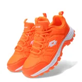 Championes Lotto Hockey color naranja con detalles en blanco.