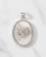 Dije ovalado de plata 925 con base de nácar, borde decorado con circonias y diseño central de nene y nena.