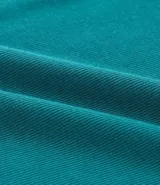 Blusa tipo muscle tee de Ashua, confeccionada en tejido ribana con textura acanalada, cuello redondo y diseño sin mangas.