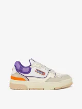Championes Autry modelo CLC Low para mujer, color blanco hueso con detalles en gris, naranja y violeta.
