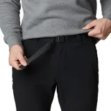 Pantalón de senderismo técnico color negro, con tejido elástico y repelente al agua. Cuenta con bolsillos laterales, bolsillo de seguridad con cierre, cinturón integrado y cremalleras en los tobillos para mayor ajuste.