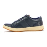 Championes casuales de hombre color azul marino, con cierre lateral, cordones al tono y suela de goma en color crema con base caramelo.
