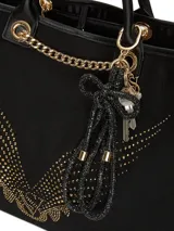 Llavero con correa de muñeca de textura brillante en color negro, adornado con un nudo y herrajes metálicos dorados.