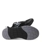 Championes deportivos Topper modelo Drive 2, color negro con detalles en gris claro. Presentan capellada de malla transpirable, refuerzos sintéticos y logo Topper en el lateral. La suela es gruesa y de color negro con puntera y talón en gris.