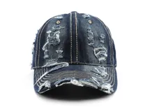 Pack de gorros tipo baseball, con visera y corona, confeccionados en tela de jean con efecto desgastado y roturas. Se muestran tres tonos: azul oscuro, azul claro y negro.