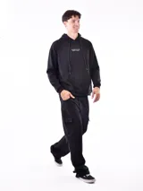 Buzo hoodie negro con bolsillo canguro y cordones ajustables. Estampado con la frase "YOU DON'T HAVE TO BE PERFECT TO START" en el pecho.