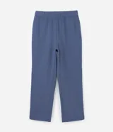 Pantalón deportivo de corte holgado, confeccionado en algodón con felpa, con cintura elástica y bolsillos laterales.