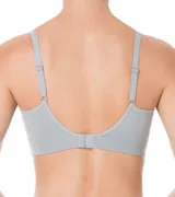 Soutien top blanco de microfibra, sin aro ni relleno, con breteles finos y espalda deportiva.