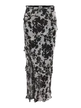 Pollera larga de tiro alto con estampa animal print tipo vaca, confeccionada en tejido liviano y fluido. Presenta un tajo frontal con detalle de volados en los bordes.