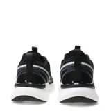 Championes urbanos Umbro modelo Vex, color negro con detalles en blanco y gris. Presentan una capellada de malla transpirable con refuerzos sintéticos, logo de la marca en el lateral y una entresuela robusta de diseño moderno.