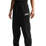 Pantalón deportivo Nike de corte holgado, color negro, con cintura elástica y puños ajustados en los tobillos. Presenta el logo de la marca bordado en color blanco en la parte superior del muslo izquierdo.