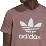 Remera color óxido con logo Adidas Trefoil estampado en blanco en el pecho. Corte clásico y cuello redondo.