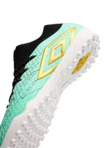 Championes de fútbol 5 Umbro modelo Ignis TF, con diseño de corte medio en tejido elástico color azul marino y cuerpo texturizado en color amarillo. Presenta suela de goma con tapones pequeños para césped sintético y logo de la marca en el lateral.