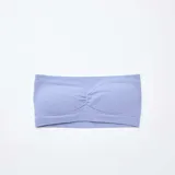 Bandeau de diseño strapless confeccionado en tejido de canalé, con detalle fruncido en el centro del pecho y acabado sin costuras.