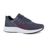 Championes deportivos American Sport Fluke, color celeste con detalles en azul marino y verde lima. Capellada de malla transpirable y suela blanca con detalles en negro.