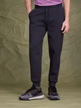 Pantalón de jogging negro con cintura elástica y cordón de ajuste, de corte entallado y puños acanalados en los tobillos.