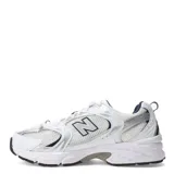 Championes New Balance 530 de estilo retro, color blanco con detalles plateados y azul marino, con parte superior de malla y material sintético, y entresuela con amortiguación ABZORB.