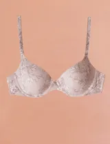 Soutien de lycra color lila con estampado floral, con aro y copa preformada. Breteles fijos regulables.