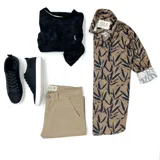 Camisa de manga larga color marrón con estampado de hojas negras, cuello clásico y puños con interior estampado.