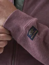 Campera bomber con cierre completo, color azul marino.