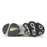 Championes New Balance modelo 1000 de hombre, color crema con detalles en gris y logo "N" en los laterales.