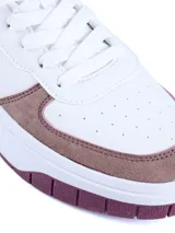 Championes urbanos Umbro modelo Milo-Bold, color negro con detalles en rosa. Presentan una combinación de materiales sintéticos y gamuza, con el logo de la marca en el lateral y una suela de plataforma blanca con relieve.