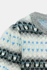 Jersey de punto con cuello redondo y mangas largas abullonadas, con diseño de jacquard geométrico en tonos grises, blancos y celestes.