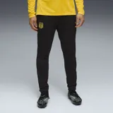 Pantalón de entrenamiento Puma del Club Atlético Peñarol, color negro, con ajuste entallado, cintura elástica y escudo del club en el muslo derecho.