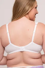 Soutien reductor blanco con bretel ancho, sin aro, confeccionado en LYCRA® con detalle de encaje lila y microtul en copa. Breteles elásticos regulables y ganchos reforzados en espalda.