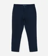 Pantalón de sastrería corte slim, color azul marino, con cintura elástica, trabillas para cinturón, cierre tradicional y bolsillos laterales.