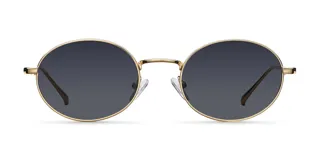Lentes de sol con montura ovalada de acero inoxidable en color dorado y cristales polarizados en color negro. Diseño inspirado en el estilo clásico retro.