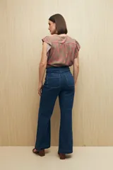 Pantalón Oxford negro de tiro alto con bolsillos delanteros y traseros.