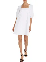 Vestido blanco de algodón orgánico hasta la rodilla, con escote cuadrado, mangas abullonadas y espalda descubierta.