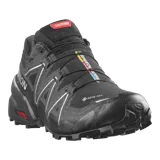 Championes de trail running Salomon Speedcross 6 Gore-Tex edición limitada 20 Years, color negro con detalles plateados y rojos. Cuenta con suela Contagrip, tecnología Gore-Tex impermeable y sistema de ajuste rápido Quicklace.