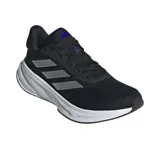 Championes Adidas Response Super negros con detalles plateados y suela blanca. Presentan las tres tiras características de la marca en los laterales y tecnología Dreamstrike en la entresuela para mayor amortiguación.