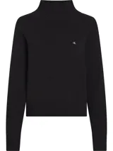 Sweater negro de punto de algodón suave, con cuello alto, corte relaxed, puños y bajo de canalé, y logo CK bordado en el pecho.