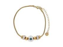 Pulsera dorada de acero con dije central de ojo turco esmaltado en blanco y azul, y detalles de circonias.