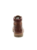 Bota de cuero vacuno con textura granulada, acordonada, con suela de goma dentada y cuello acolchado.