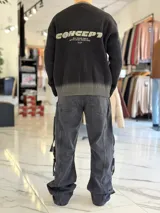 Sweater de punto color beige con efecto degradé tostado en el cuello, los puños y el ruedo, cuello redondo y bordado frontal con la palabra "Love".