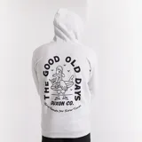 Canguro gris claro melange de algodón con felpa, con capucha y cordones ajustables. Estampa en la espalda con un pato surfer y la frase "The Good Old Days".