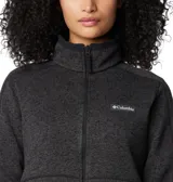 Campera polar Columbia con cierre frontal completo, confeccionada en tejido tipo jersey de textura jaspeada. Presenta cuello alto, bolsillos laterales con cierre y ribetes elásticos en puños y cuello.