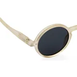 Lentes de sol Izipizi Sun G con montura redonda color beige y cristales negros polarizados.