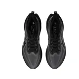 Championes Asics Novablast 3 LE, color negro con detalles en gris, ideales para running.