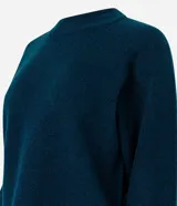 Suéter de tricot color blanco, con cuello redondo, mangas largas y terminaciones acanaladas en puños y ruedo.