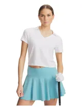 Remera polo Under Armour de mujer, color blanco, con cuello en V abierto y mangas cortas de corte ligeramente corto.