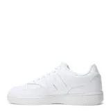 Championes New Balance modelo 080, color blanco, con logo "N" en los laterales y perforaciones en la puntera.
